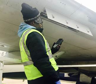 man conducting an electronic fuel ticketing